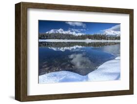 Wooden Chalet Surrounded by Snowy Peaks and Woods Reflected in Lake Palu, Valtellina, Italy-Roberto Moiola-Framed Photographic Print