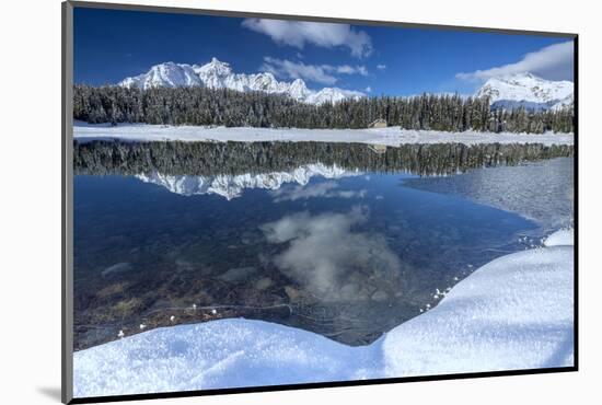 Wooden Chalet Surrounded by Snowy Peaks and Woods Reflected in Lake Palu, Valtellina, Italy-Roberto Moiola-Mounted Photographic Print