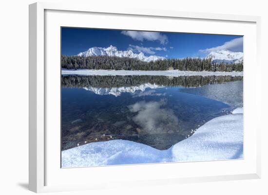 Wooden Chalet Surrounded by Snowy Peaks and Woods Reflected in Lake Palu, Valtellina, Italy-Roberto Moiola-Framed Photographic Print