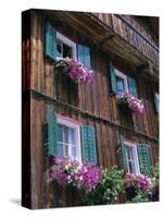 Wooden Chalet with Flowers, Hallstatt, Austria, Europe-Jean Brooks-Stretched Canvas