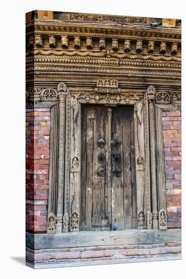 Wooden door, Bhaktapur, Kathmandu, Nepal.-Lee Klopfer-Stretched Canvas