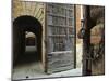 Wooden Fortified Gates and Alley of Medieval Town, Buonconvento, Italy-Dennis Flaherty-Mounted Photographic Print