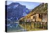 Wooden Hut and Colourful Woods Reflected in Lake Braies, Italy-Roberto Moiola-Stretched Canvas