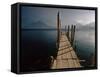 Wooden Jetty and Volcanoes in the Distance, Lago Atitlan (Lake Atitlan), Guatemala, Central America-Colin Brynn-Framed Stretched Canvas