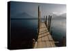 Wooden Jetty and Volcanoes in the Distance, Lago Atitlan (Lake Atitlan), Guatemala, Central America-Colin Brynn-Stretched Canvas