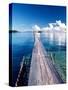 Wooden Jetty Extending off Kadidiri Island, Togian Islands, Sulawesi-Jay Sturdevant-Stretched Canvas