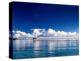 Wooden Jetty Extending off Kadidiri Island, Togian Islands, Sulawesi-Jay Sturdevant-Stretched Canvas