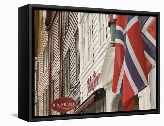 Wooden Merchants Premises and Norwegian Flag, Bryggen Old Harbour Side, Bergen, Norway, Scandinavia-James Emmerson-Framed Stretched Canvas