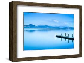 Wooden Pier or Jetty and on A Blue Lake Sunset and Sky Reflection on Water. Versilia Tuscany, Italy-stevanzz-Framed Photographic Print