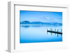 Wooden Pier or Jetty and on A Blue Lake Sunset and Sky Reflection on Water. Versilia Tuscany, Italy-stevanzz-Framed Photographic Print