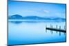 Wooden Pier or Jetty and on A Blue Lake Sunset and Sky Reflection on Water. Versilia Tuscany, Italy-stevanzz-Mounted Photographic Print