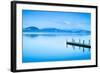 Wooden Pier or Jetty and on A Blue Lake Sunset and Sky Reflection on Water. Versilia Tuscany, Italy-stevanzz-Framed Photographic Print