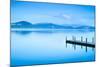 Wooden Pier or Jetty and on A Blue Lake Sunset and Sky Reflection on Water. Versilia Tuscany, Italy-stevanzz-Mounted Photographic Print