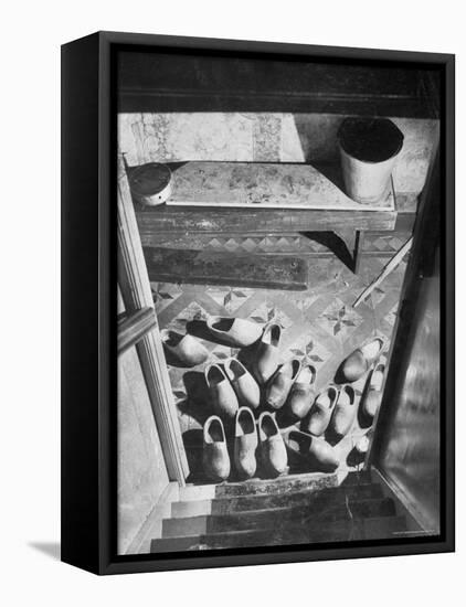 Wooden Shoes in a Hallway at the Bottom of the Stairs-George Rodger-Framed Stretched Canvas