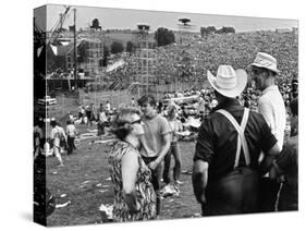 Woodstock, Farmer Max Yasgur Looks On As His Grounds Are Used For Woodstock Festival, 1970-null-Stretched Canvas