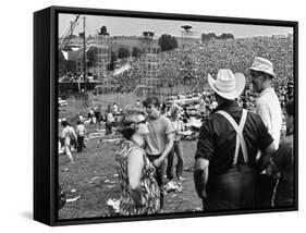 Woodstock, Farmer Max Yasgur Looks On As His Grounds Are Used For Woodstock Festival, 1970-null-Framed Stretched Canvas