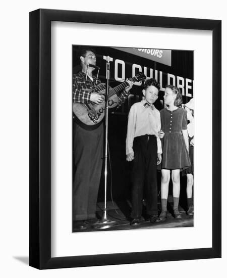 Woody Guthrie (1912-1967)-null-Framed Premium Giclee Print