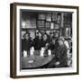 Woody Guthrie Playing and Singing for Patrons of Mcsorley's Bar-Eric Schaal-Framed Premium Photographic Print