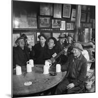 Woody Guthrie Playing and Singing for Patrons of Mcsorley's Bar-Eric Schaal-Mounted Premium Photographic Print
