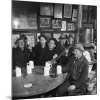 Woody Guthrie Playing and Singing for Patrons of Mcsorley's Bar-Eric Schaal-Mounted Premium Photographic Print