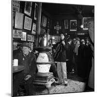 Woody Guthrie Playing in McSorley's Pub-Eric Schaal-Mounted Premium Photographic Print