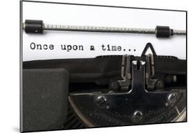 Words "Once Upon A Time" Written With Old Typewriter-null-Mounted Poster