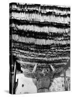 Worker at Pasta Factory Inspecting Spaghetti in Drying Room-Alfred Eisenstaedt-Stretched Canvas