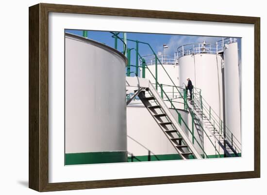 Worker Inspecting An Oil Storage Tank-Geoff Tompkinson-Framed Photographic Print