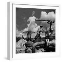 Worker Opening up a Pipeline to Let the Oil Flow-Thomas D^ Mcavoy-Framed Photographic Print