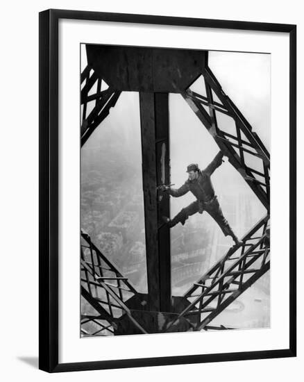 Worker Painting the Eiffel Tower-null-Framed Photo