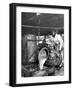 Worker Pouring Gum from Pine Trees into a Still During Turpentine Production-Hansel Mieth-Framed Photographic Print