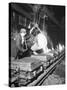Worker Pouring Hot Steel into Molds at Auto Manufacturing Plant-Ralph Morse-Stretched Canvas
