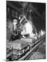 Worker Pouring Hot Steel into Molds at Auto Manufacturing Plant-Ralph Morse-Mounted Photographic Print