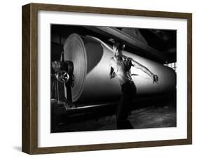 Worker Tearing Off a Sample from a Roll of Paper to Test Its Quality-Margaret Bourke-White-Framed Photographic Print