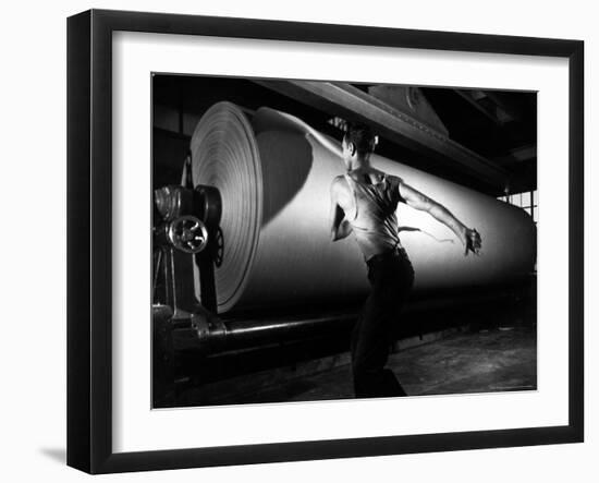 Worker Tearing Off a Sample from a Roll of Paper to Test Its Quality-Margaret Bourke-White-Framed Photographic Print