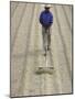 Worker Using Hoe Like Device to Turn Coffee Beans Drying in the Sun at La Retana Plantation-John Dominis-Mounted Photographic Print