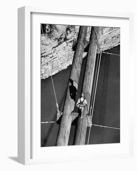 Worker Walking on the Texas Illinois Natural Gas Company's Pipeline Suspension Bridge-John Dominis-Framed Photographic Print