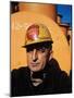 Worker Wearing Safety Helmet Outside at Sun Shipbuilding and Dry Dock Co. Shipyards-Dmitri Kessel-Mounted Photographic Print