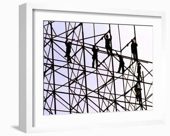 Workers Assemble the Frame of an Advertising Billboard Alongside a Bangkok Expressway-null-Framed Premium Photographic Print