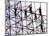Workers Assemble the Frame of an Advertising Billboard Alongside a Bangkok Expressway-null-Mounted Photographic Print