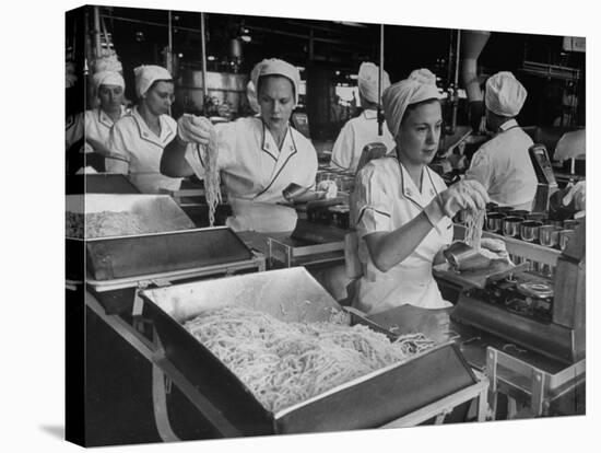 Workers at Ann Page Plant Transferring Spaghetti from Bins into Rows of Cans-null-Stretched Canvas