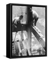 Workers balancing on steel beam above streets during construction of the Manhattan Company Building-Arthur Gerlach-Framed Stretched Canvas