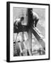 Workers balancing on steel beam above streets during construction of the Manhattan Company Building-Arthur Gerlach-Framed Photographic Print