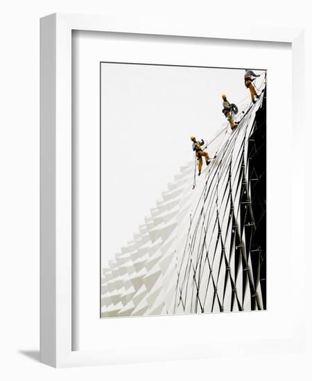 Workers Climb Down the Roof of Singapore's Spikey Fruit Shaped Esplanade Arts Center-null-Framed Photographic Print