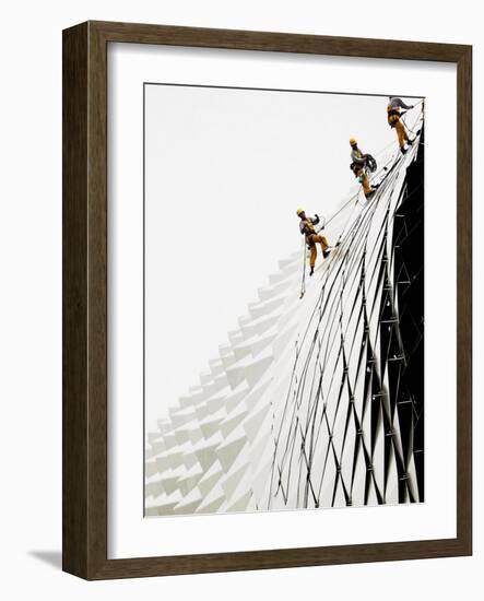 Workers Climb Down the Roof of Singapore's Spikey Fruit Shaped Esplanade Arts Center-null-Framed Photographic Print