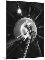 Workers Connecting Sections of Water Pipe in Tunnel-Ralph Crane-Mounted Photographic Print