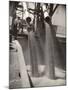 Workers Guiding Granary Filling Spouts as They Pour Tons of Wheat into River Barge for Shipment-Margaret Bourke-White-Mounted Photographic Print