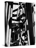 Workers Lower Pipe into Oil Well Inside Rig in a Texaco Oil Field-Margaret Bourke-White-Stretched Canvas