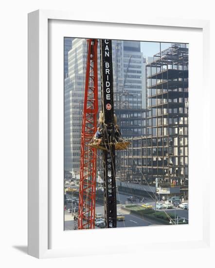 Workers Service Crane Across Street from National Bank Building under Construction on Park Ave-Dmitri Kessel-Framed Photographic Print