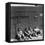 Workers Sitting Against Wall During Lunch Break, at Vega Aircraft Plant, During WWII: Burbank, Ca-Charles Fenno Jacobs-Framed Stretched Canvas